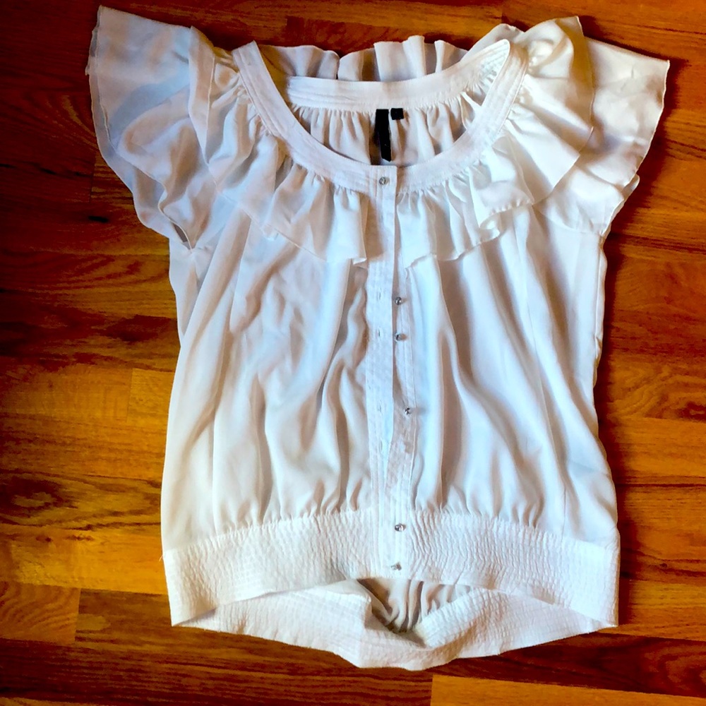 White blouse with sparkly buttons